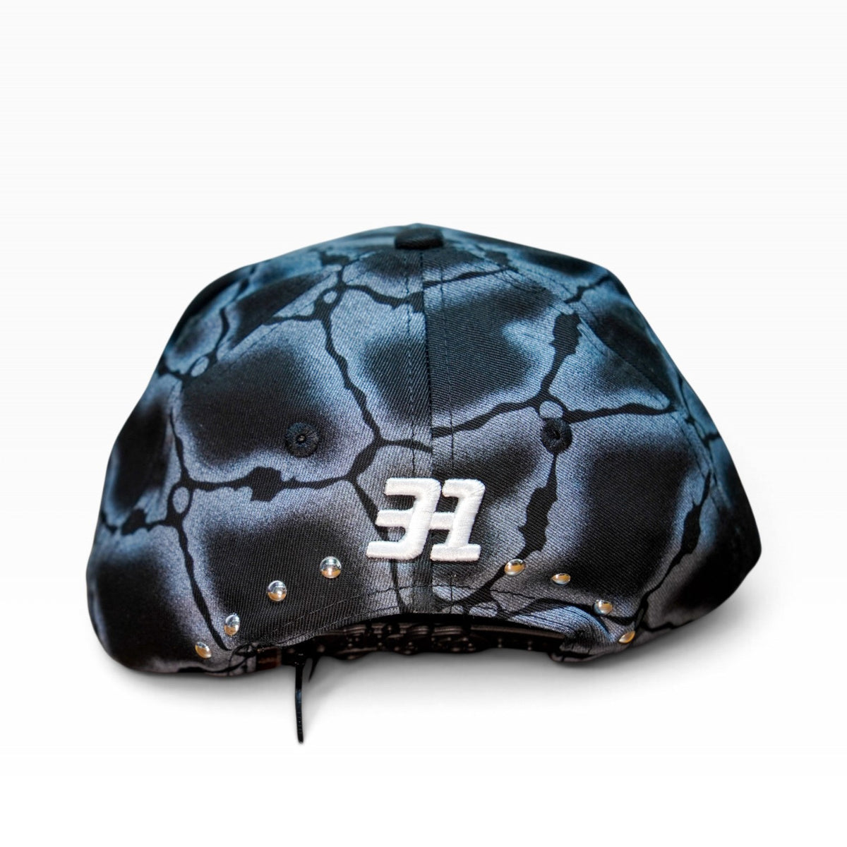 31 Hats Caged In